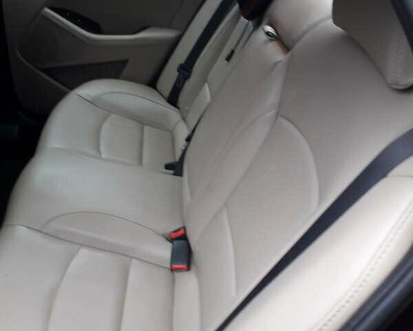 Червоний Кіа Оптіма, об'ємом двигуна 2.4 л та пробігом 100 тис. км за 13999 $, фото 6 на Automoto.ua