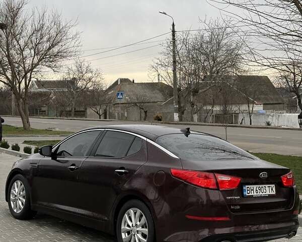 Красный Киа Оптима, объемом двигателя 2.4 л и пробегом 170 тыс. км за 9800 $, фото 3 на Automoto.ua