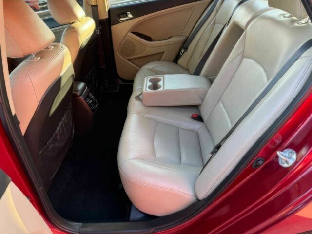 Красный Киа Оптима, объемом двигателя 2.4 л и пробегом 83 тыс. км за 5000 $, фото 11 на Automoto.ua