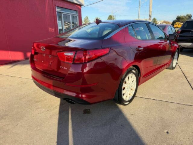 Красный Киа Оптима, объемом двигателя 2.4 л и пробегом 83 тыс. км за 5000 $, фото 5 на Automoto.ua