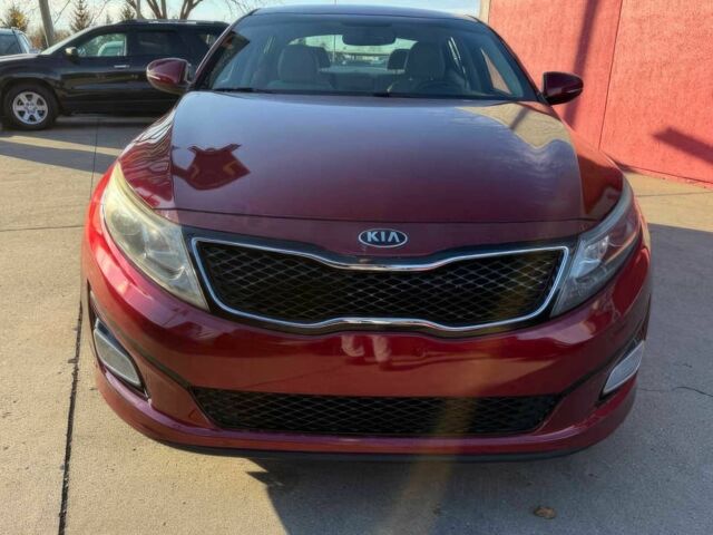 Красный Киа Оптима, объемом двигателя 2.4 л и пробегом 83 тыс. км за 5000 $, фото 1 на Automoto.ua