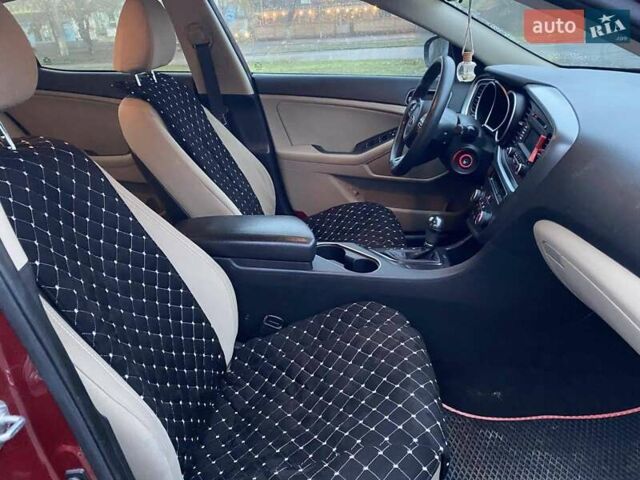 Красный Киа Оптима, объемом двигателя 2.36 л и пробегом 162 тыс. км за 9700 $, фото 16 на Automoto.ua