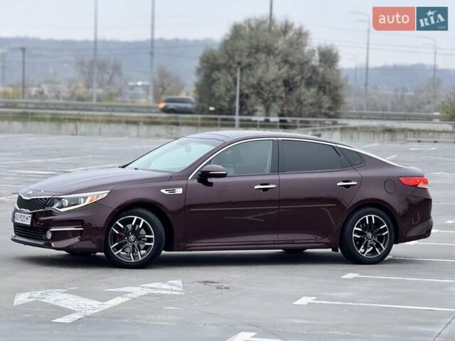 Красный Киа Оптима, объемом двигателя 2.36 л и пробегом 154 тыс. км за 12500 $, фото 1 на Automoto.ua