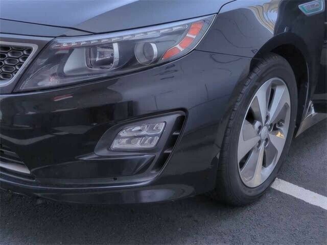 Красный Киа Оптима, объемом двигателя 2.4 л и пробегом 79 тыс. км за 4100 $, фото 2 на Automoto.ua