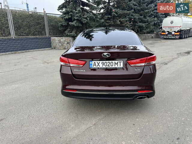 Киа Оптима 2015 в Харькове на Automoto.ua Красный Киа Оптима, объемом двигателя 2.4 л и пробегом 154 тыс. км за 12500 $, фото 6 на Automoto.ua