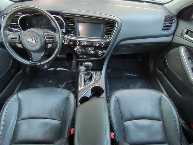 Красный Киа Оптима, объемом двигателя 2.4 л и пробегом 79 тыс. км за 4100 $, фото 4 на Automoto.ua