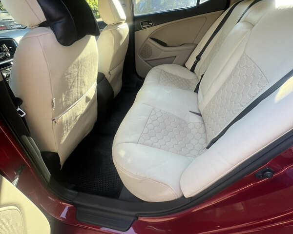 Красный Киа Оптима, объемом двигателя 2.36 л и пробегом 183 тыс. км за 8250 $, фото 13 на Automoto.ua