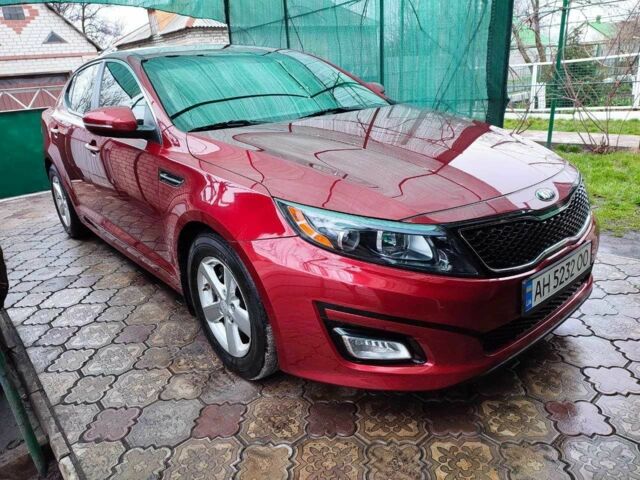 Красный Киа Оптима, объемом двигателя 2.4 л и пробегом 124 тыс. км за 9000 $, фото 1 на Automoto.ua