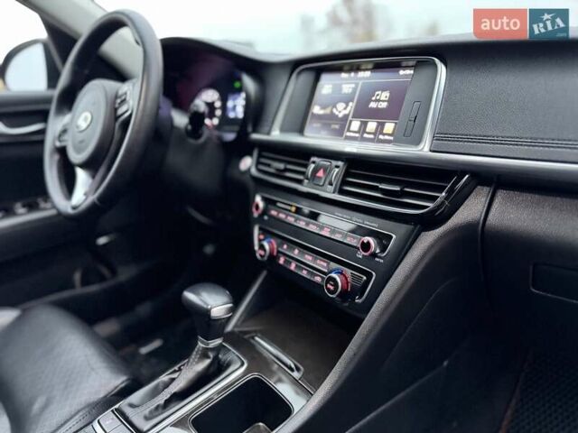 Красный Киа Оптима, объемом двигателя 2.36 л и пробегом 154 тыс. км за 12500 $, фото 33 на Automoto.ua