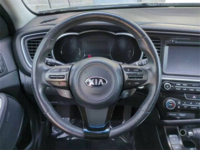 Красный Киа Оптима, объемом двигателя 2.4 л и пробегом 79 тыс. км за 4100 $, фото 6 на Automoto.ua