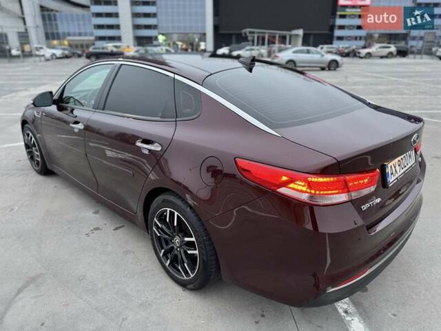 Красный Киа Оптима, объемом двигателя 2.4 л и пробегом 154 тыс. км за 12200 $, фото 13 на Automoto.ua