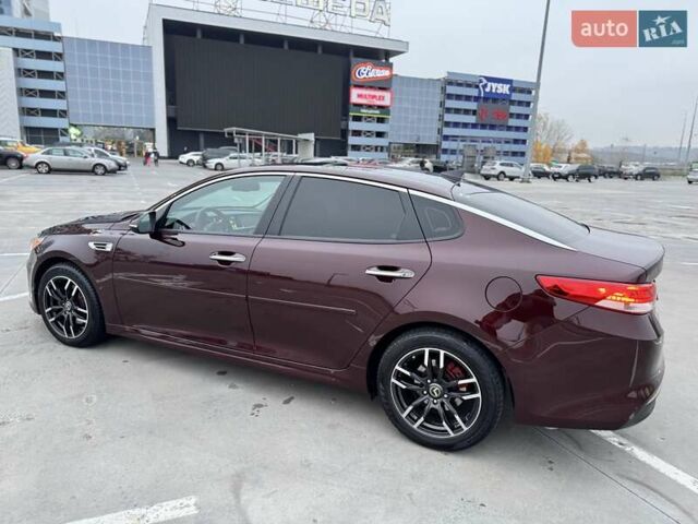 Красный Киа Оптима, объемом двигателя 2.36 л и пробегом 154 тыс. км за 12500 $, фото 10 на Automoto.ua