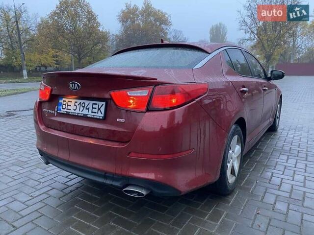 Красный Киа Оптима, объемом двигателя 2.36 л и пробегом 162 тыс. км за 9700 $, фото 5 на Automoto.ua