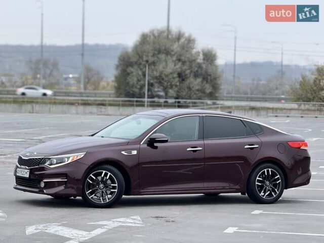 Красный Киа Оптима, объемом двигателя 2.4 л и пробегом 154 тыс. км за 12200 $, фото 3 на Automoto.ua