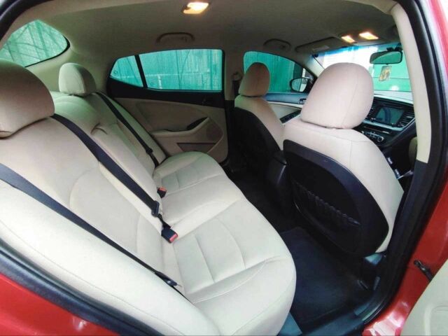 Красный Киа Оптима, объемом двигателя 2.4 л и пробегом 124 тыс. км за 9000 $, фото 4 на Automoto.ua