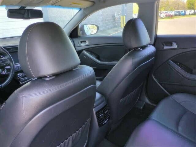 Красный Киа Оптима, объемом двигателя 2.4 л и пробегом 79 тыс. км за 4100 $, фото 10 на Automoto.ua