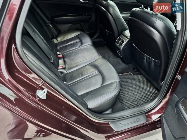 Красный Киа Оптима, объемом двигателя 2.4 л и пробегом 154 тыс. км за 12200 $, фото 41 на Automoto.ua