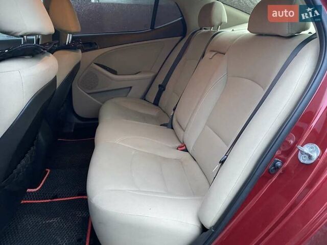 Красный Киа Оптима, объемом двигателя 2.36 л и пробегом 162 тыс. км за 9700 $, фото 13 на Automoto.ua