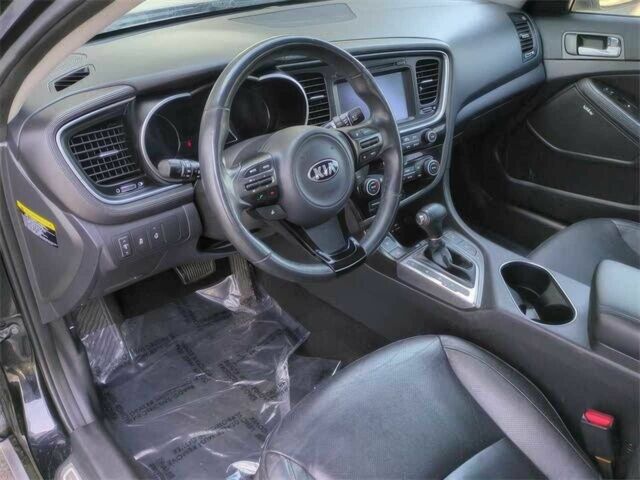 Красный Киа Оптима, объемом двигателя 2.4 л и пробегом 79 тыс. км за 4100 $, фото 8 на Automoto.ua