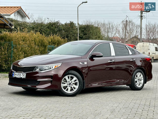 Красный Киа Оптима, объемом двигателя 2.36 л и пробегом 210 тыс. км за 11200 $, фото 7 на Automoto.ua