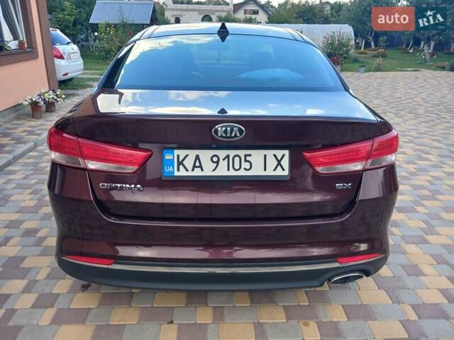 Червоний Кіа Оптіма, об'ємом двигуна 2.36 л та пробігом 141 тис. км за 10700 $, фото 10 на Automoto.ua