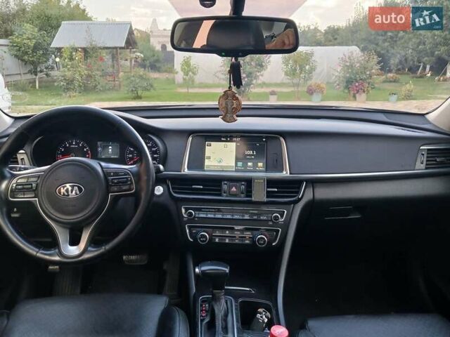 Червоний Кіа Оптіма, об'ємом двигуна 2.36 л та пробігом 141 тис. км за 10700 $, фото 8 на Automoto.ua