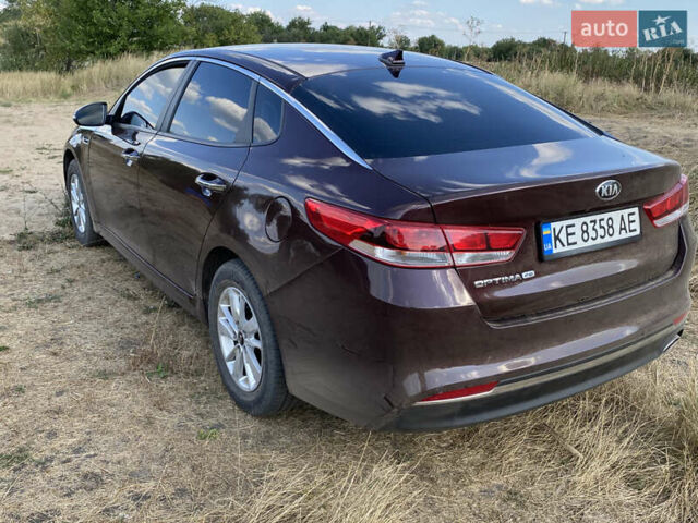 Червоний Кіа Оптіма, об'ємом двигуна 2.36 л та пробігом 120 тис. км за 10500 $, фото 4 на Automoto.ua