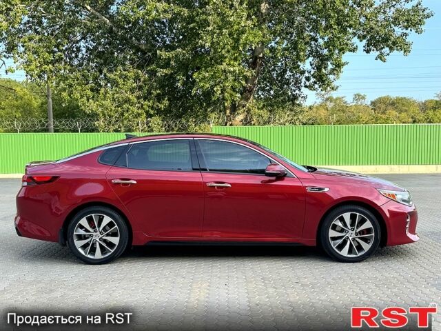 Красный Киа Оптима, объемом двигателя 2 л и пробегом 98 тыс. км за 11800 $, фото 2 на Automoto.ua
