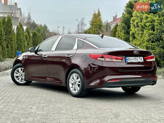 Красный Киа Оптима, объемом двигателя 2.36 л и пробегом 210 тыс. км за 11200 $, фото 6 на Automoto.ua