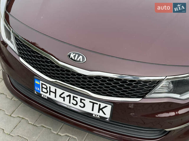 Красный Киа Оптима, объемом двигателя 2.36 л и пробегом 210 тыс. км за 11200 $, фото 14 на Automoto.ua