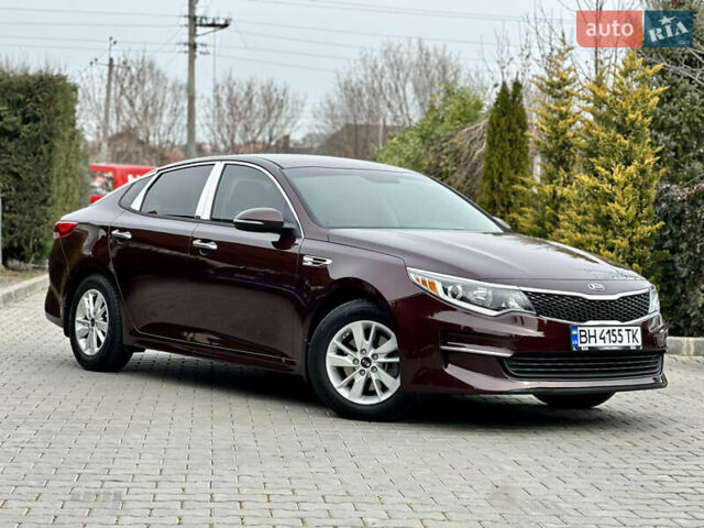 Красный Киа Оптима, объемом двигателя 2.36 л и пробегом 210 тыс. км за 11200 $, фото 5 на Automoto.ua