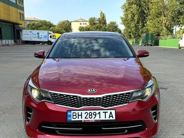 Красный Киа Оптима, объемом двигателя 2 л и пробегом 98 тыс. км за 11800 $, фото 1 на Automoto.ua
