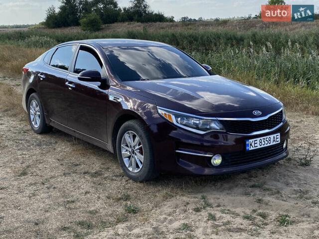 Червоний Кіа Оптіма, об'ємом двигуна 2.36 л та пробігом 120 тис. км за 10500 $, фото 2 на Automoto.ua