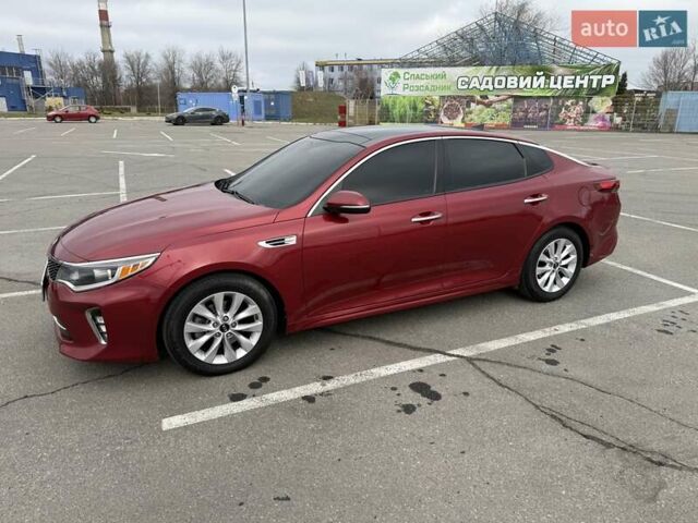 Красный Киа Оптима, объемом двигателя 2.4 л и пробегом 145 тыс. км за 12900 $, фото 1 на Automoto.ua