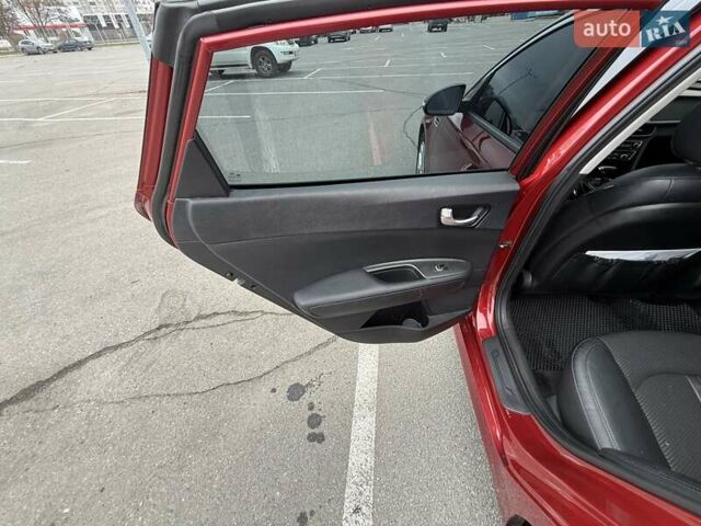 Красный Киа Оптима, объемом двигателя 2.4 л и пробегом 145 тыс. км за 12900 $, фото 9 на Automoto.ua