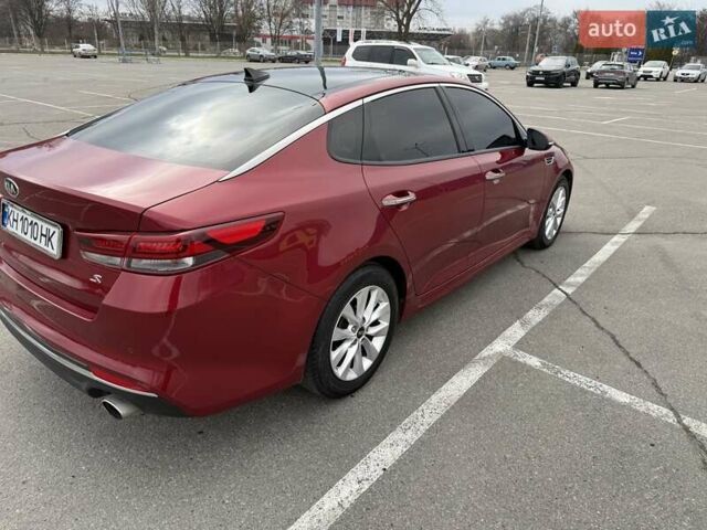 Красный Киа Оптима, объемом двигателя 2.4 л и пробегом 145 тыс. км за 12900 $, фото 4 на Automoto.ua