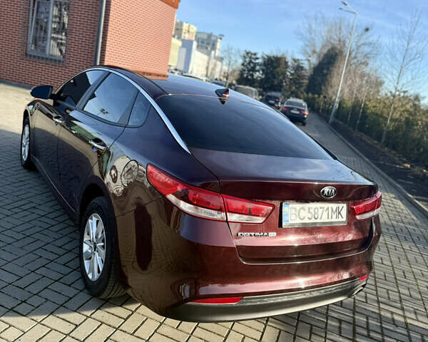 Красный Киа Оптима, объемом двигателя 2.36 л и пробегом 91 тыс. км за 10999 $, фото 8 на Automoto.ua