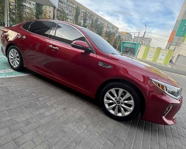 Красный Киа Оптима, объемом двигателя 2.36 л и пробегом 140 тыс. км за 13500 $, фото 3 на Automoto.ua