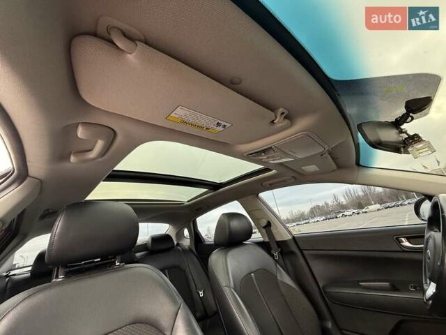 Красный Киа Оптима, объемом двигателя 2.4 л и пробегом 145 тыс. км за 12900 $, фото 12 на Automoto.ua