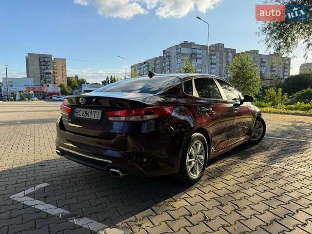 Красный Киа Оптима, объемом двигателя 2.36 л и пробегом 121 тыс. км за 9450 $, фото 5 на Automoto.ua