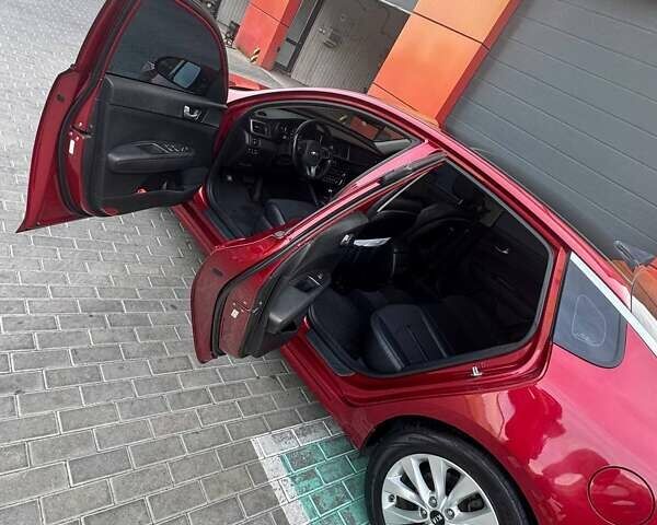 Красный Киа Оптима, объемом двигателя 2.36 л и пробегом 140 тыс. км за 13500 $, фото 16 на Automoto.ua