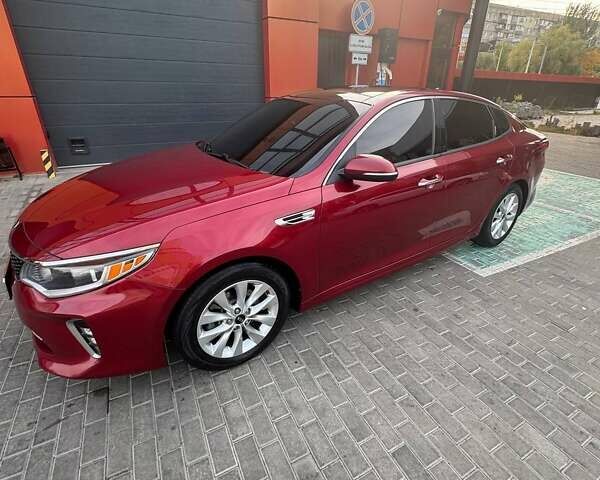 Красный Киа Оптима, объемом двигателя 2.36 л и пробегом 140 тыс. км за 13500 $, фото 2 на Automoto.ua