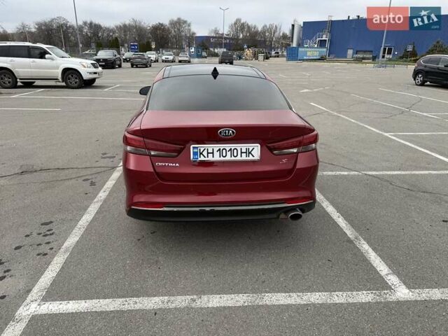 Красный Киа Оптима, объемом двигателя 2.4 л и пробегом 145 тыс. км за 12900 $, фото 3 на Automoto.ua
