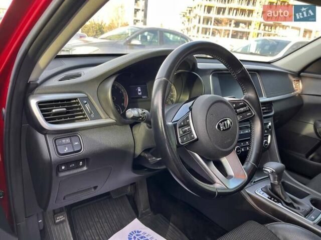 Красный Киа Оптима, объемом двигателя 2.36 л и пробегом 85 тыс. км за 12800 $, фото 8 на Automoto.ua