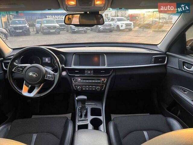 Красный Киа Оптима, объемом двигателя 2.36 л и пробегом 85 тыс. км за 12800 $, фото 11 на Automoto.ua