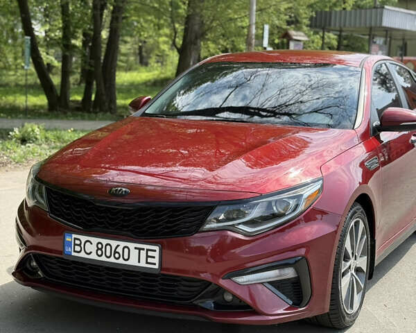 Красный Киа Оптима, объемом двигателя 2.36 л и пробегом 75 тыс. км за 13300 $, фото 18 на Automoto.ua