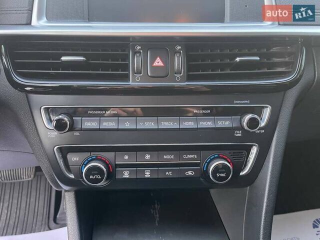 Красный Киа Оптима, объемом двигателя 2.36 л и пробегом 85 тыс. км за 12800 $, фото 14 на Automoto.ua