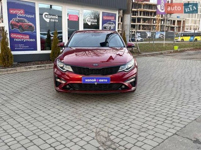 Красный Киа Оптима, объемом двигателя 2.36 л и пробегом 85 тыс. км за 12800 $, фото 1 на Automoto.ua