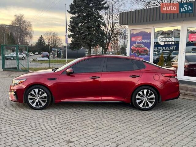 Красный Киа Оптима, объемом двигателя 2.36 л и пробегом 85 тыс. км за 12800 $, фото 7 на Automoto.ua