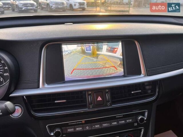 Красный Киа Оптима, объемом двигателя 2.36 л и пробегом 85 тыс. км за 12800 $, фото 13 на Automoto.ua